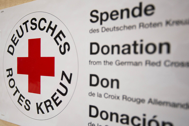 Logo DRK und Schrift Spende Donation